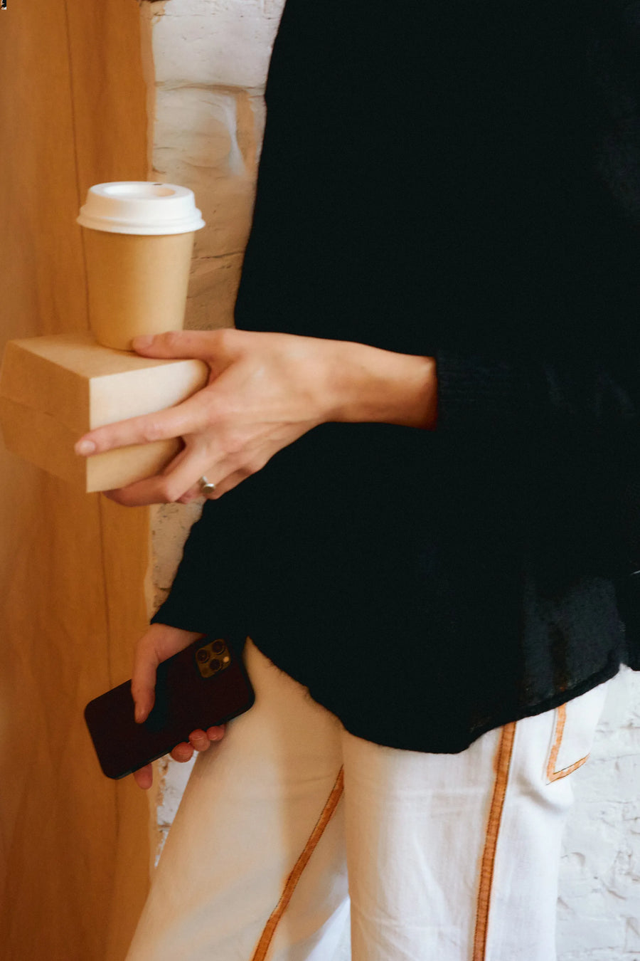 Woman holding coffee cup